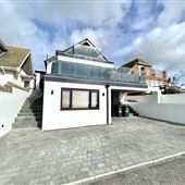 Coastal modern (accessible) family home - panoramic sea views